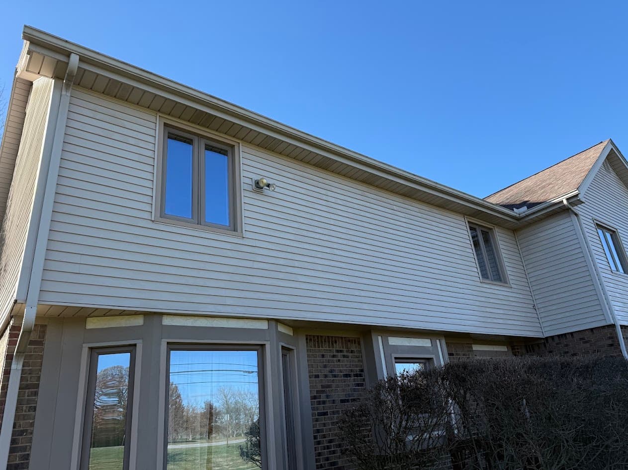 A completed, streak-free window cleaning on a home