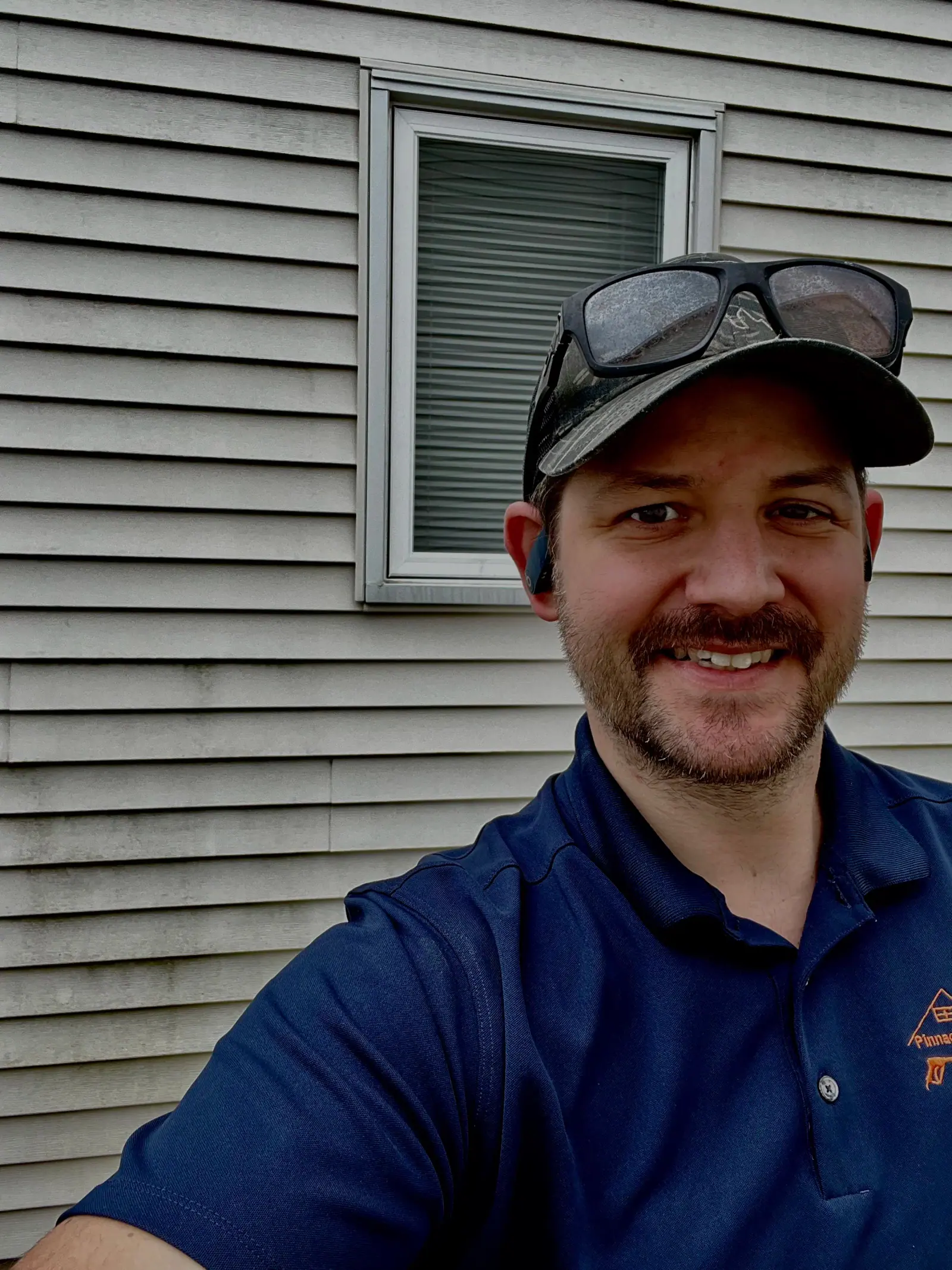 The owner of Pinnacle Pressure Washing on the job